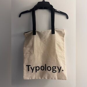 Typology Canvas Tote Bag in Cream with Black Handles